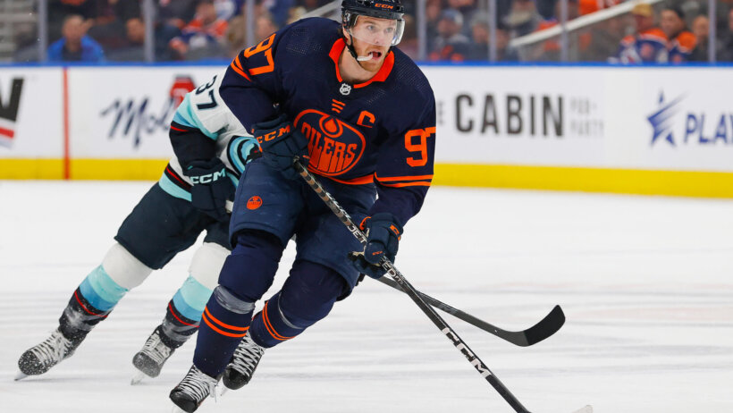 Edmonton Oilers forward Connor McDavid carries the puck up ice