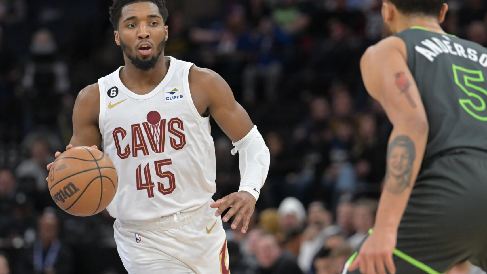 Donovan Mitchell brings the ball up court
