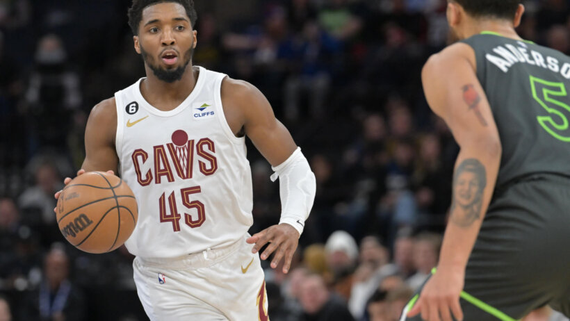 Donovan Mitchell brings the ball up court
