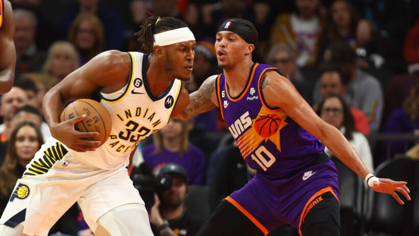 Myles Turner backs down a Suns defender