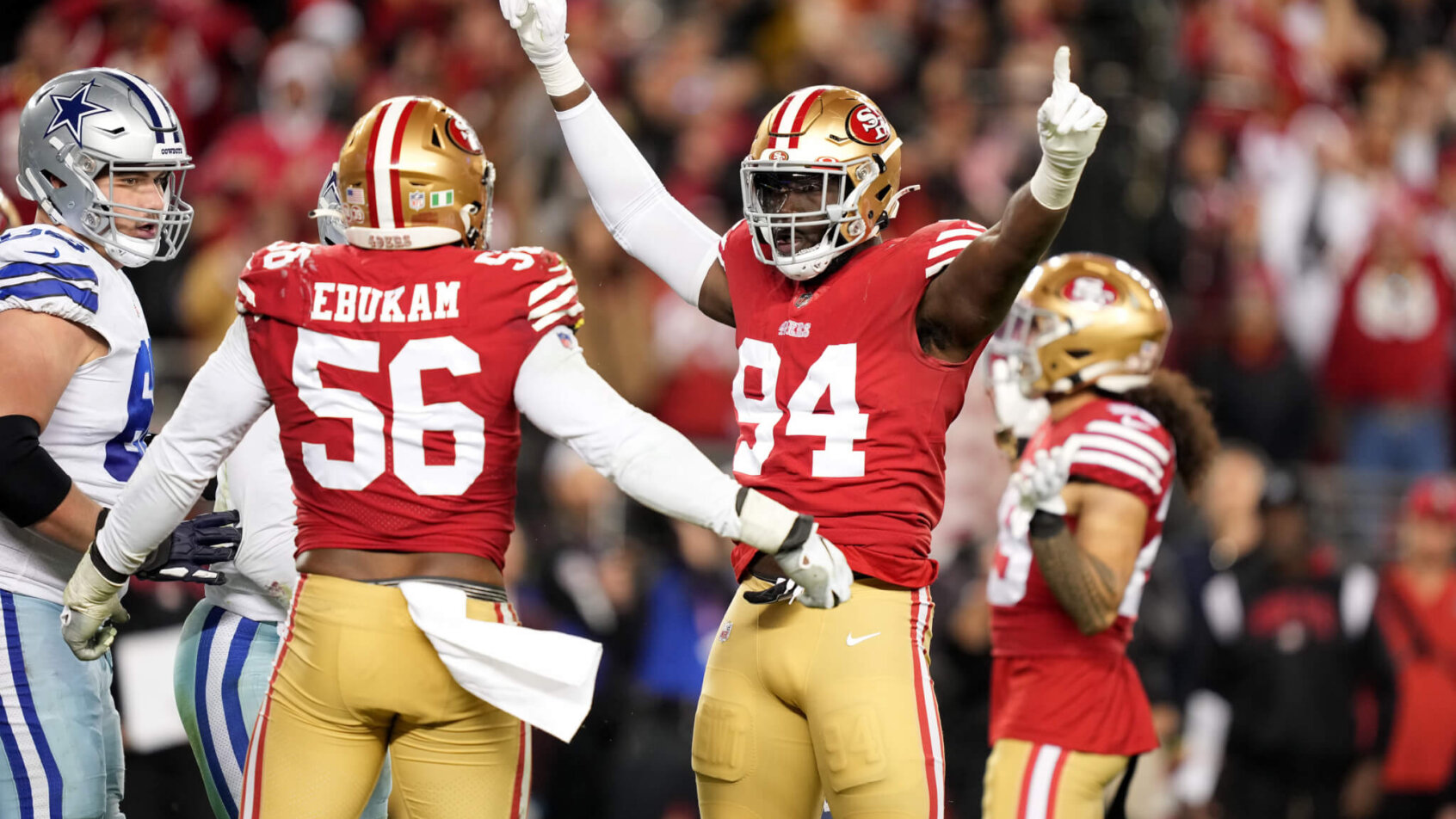 San Francisco 49ers defensive end Charles Omenihu (94) celebrates