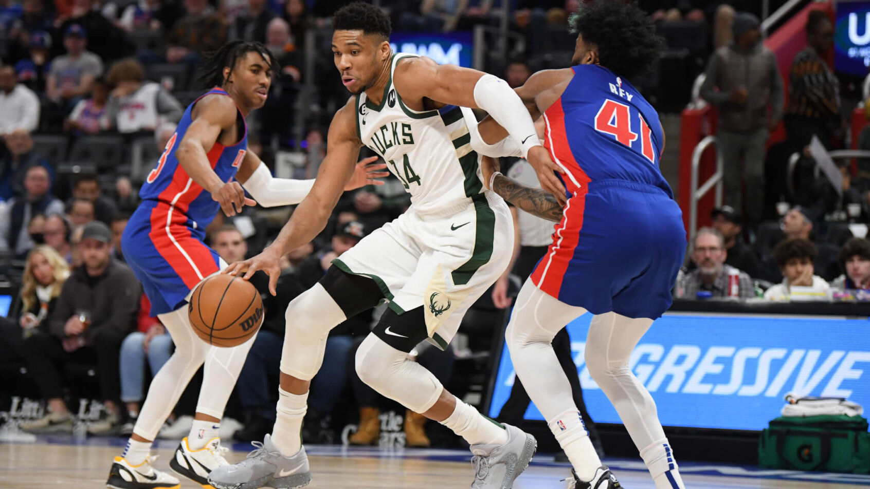 Giannis Antetokounmpo drives on the Pistons