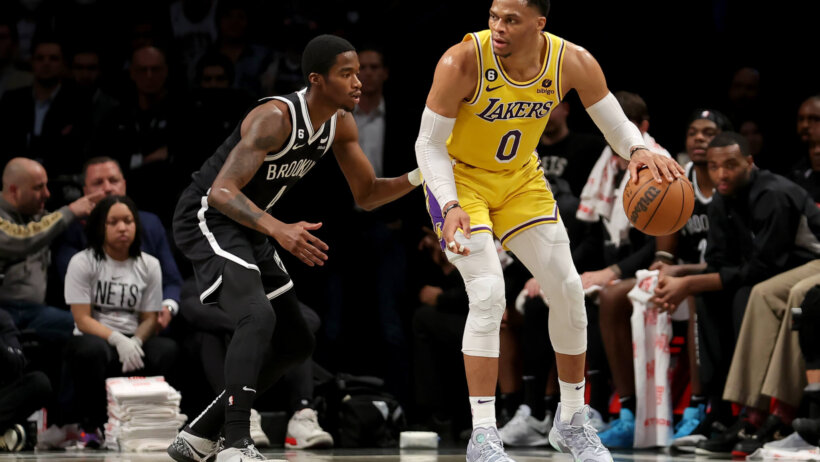 Russell Westbrook backing down defender