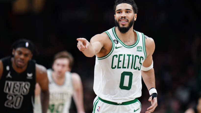 Jayson Tatum celebrates after a bucket