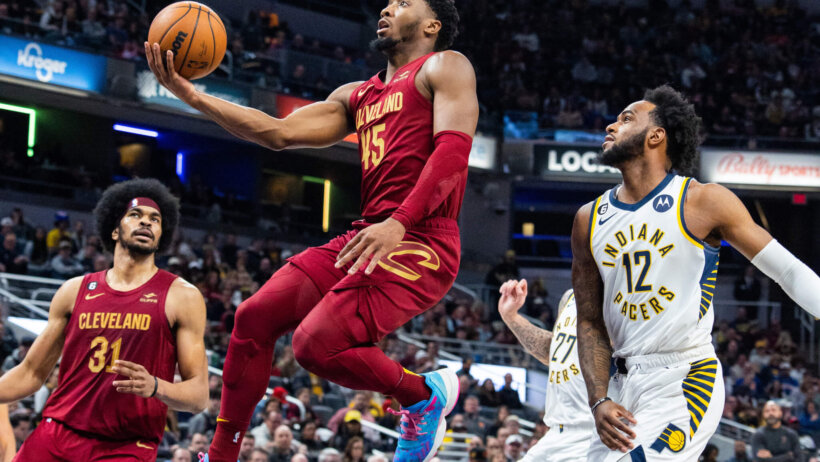Donovan Mitchell soars in for a lay-up.