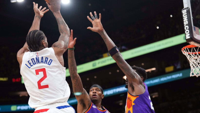 Clippers star forward Kawhi Leonard shoots.