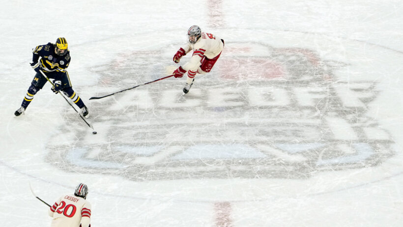 Michigan Wolverines forward Adam Fantilli with the puck