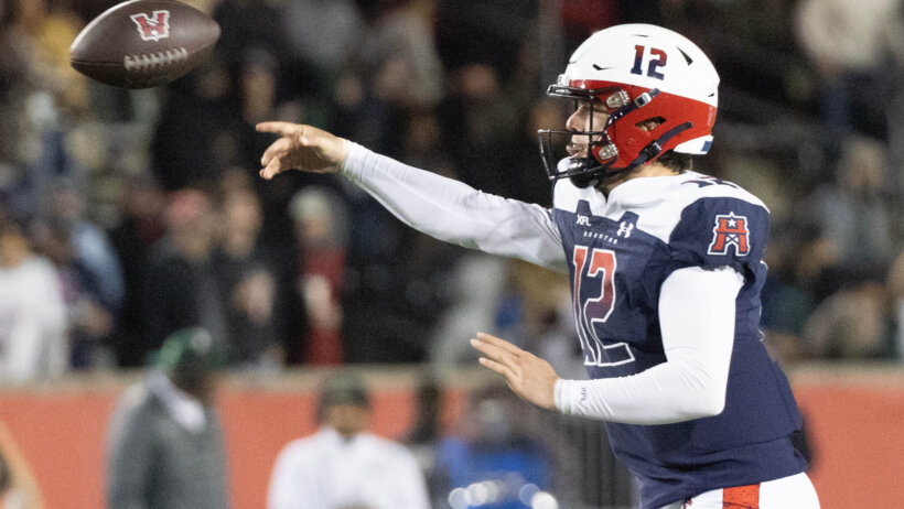 Brandon Silvers throws a pass for Houston