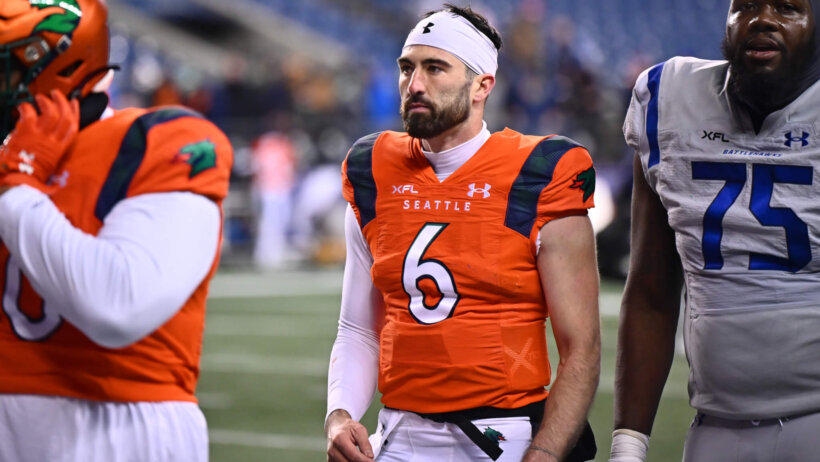 Ben DiNucci walks off the field
