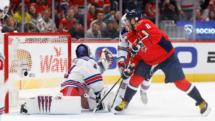 Washington Capitals left wing Alex Ovechkin deflects a shot on New York Rangers goaltender Jaroslav Halak