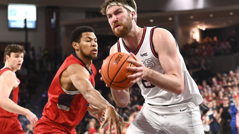 Drew Time drives to the basket versus Saint Mary's.