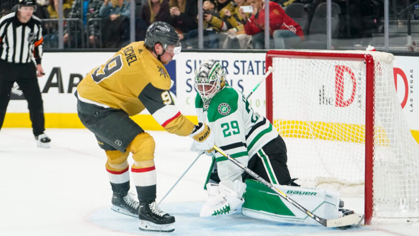 Dallas Stars goaltender Jake Oettinger makes a save against Vegas Golden Knights center Jack Eichel