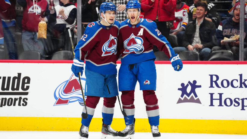 Nathan MacKinnon celebrates with Artturi Lehkonen