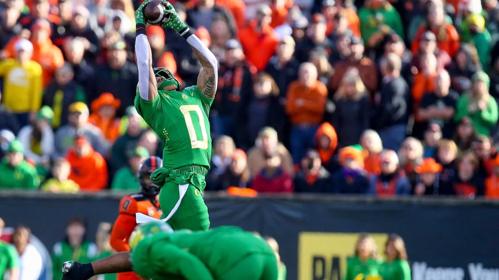 NFL Draft prospect Christian Gonzalez making an interception