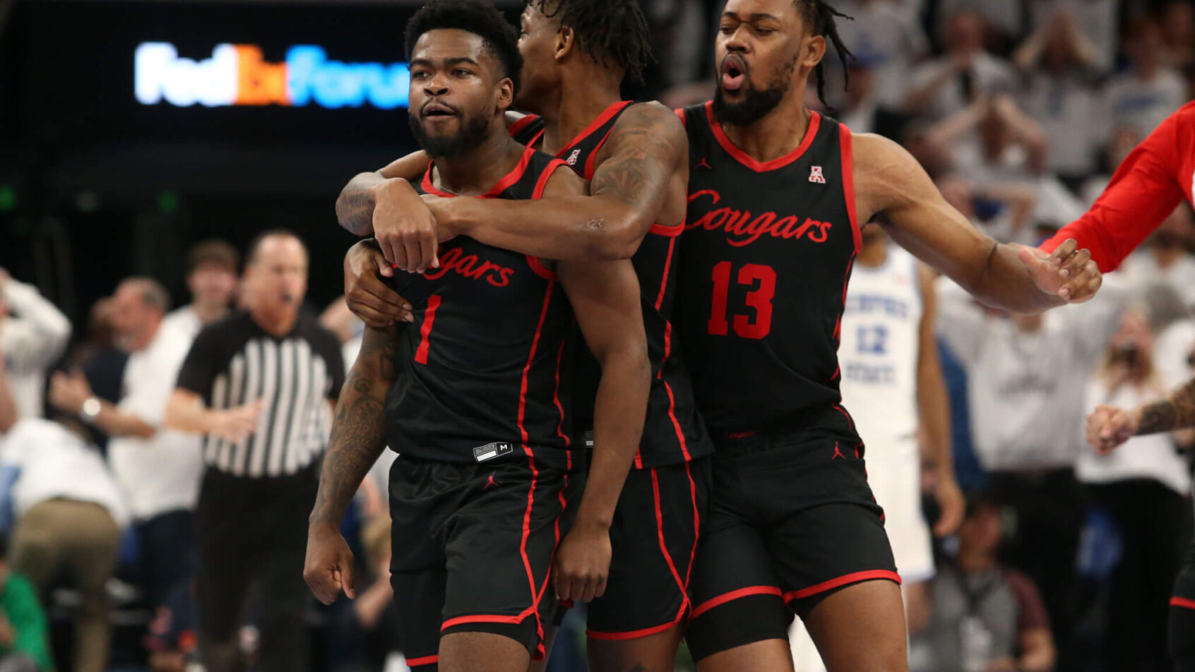 Houston Cougars celebrate a game winning shot