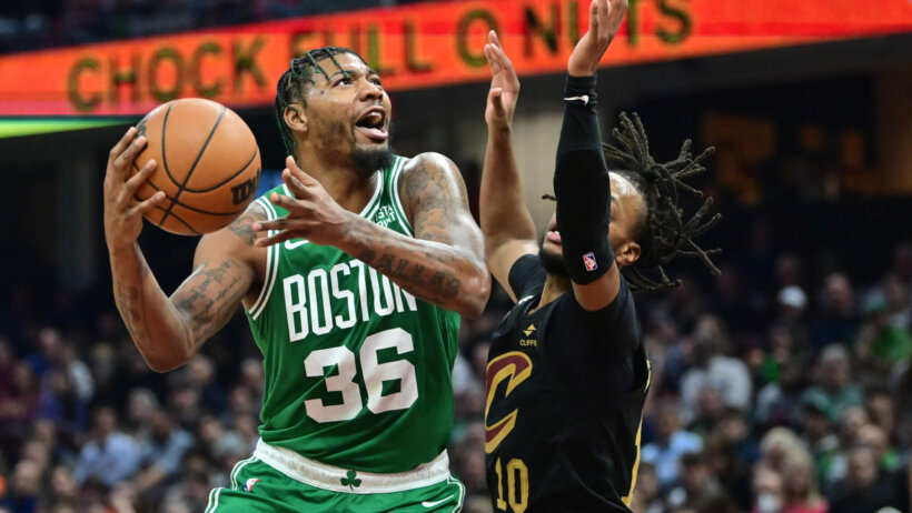 Boston Celtics guard Marcus Smart attacks the rim.