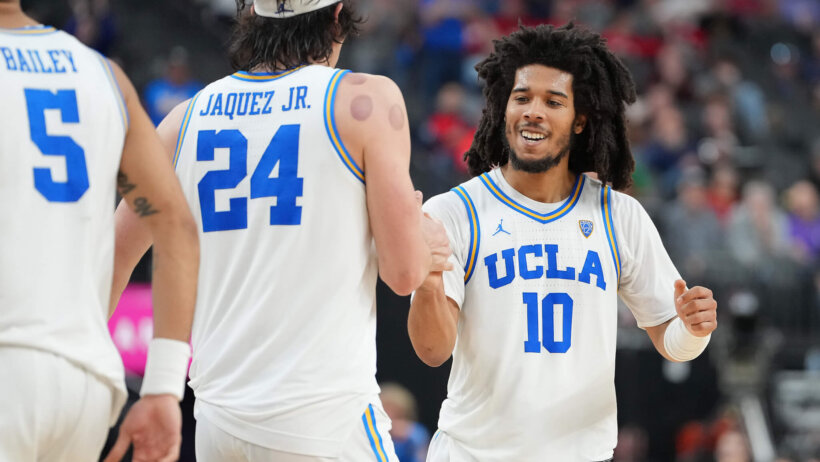 UCLA players celebrate a scoring play