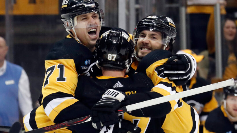 Pittsburgh Penguins Sidney Crosby, Evgeni Malkin and Kris Letang celebrate a game winning goal