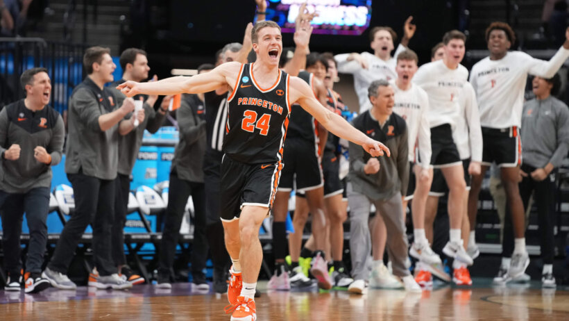 Princeton Tigers guard Blake Peters celebrates a basket