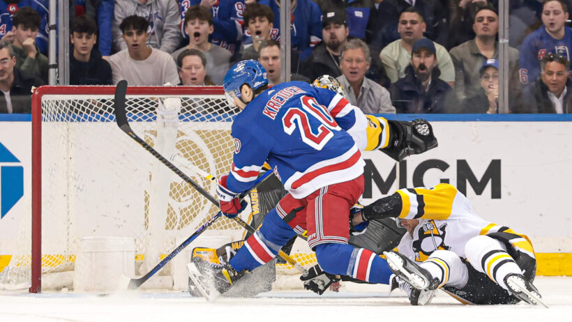 New York Rangers left wing Chris Kreider scores a goal past Pittsburgh Penguins goaltender Tristan Jarry