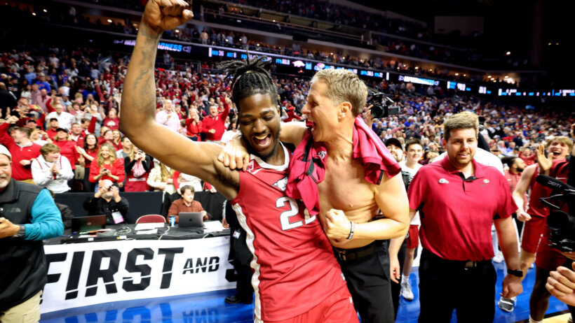 Arkansas celebrates win over Kansas.