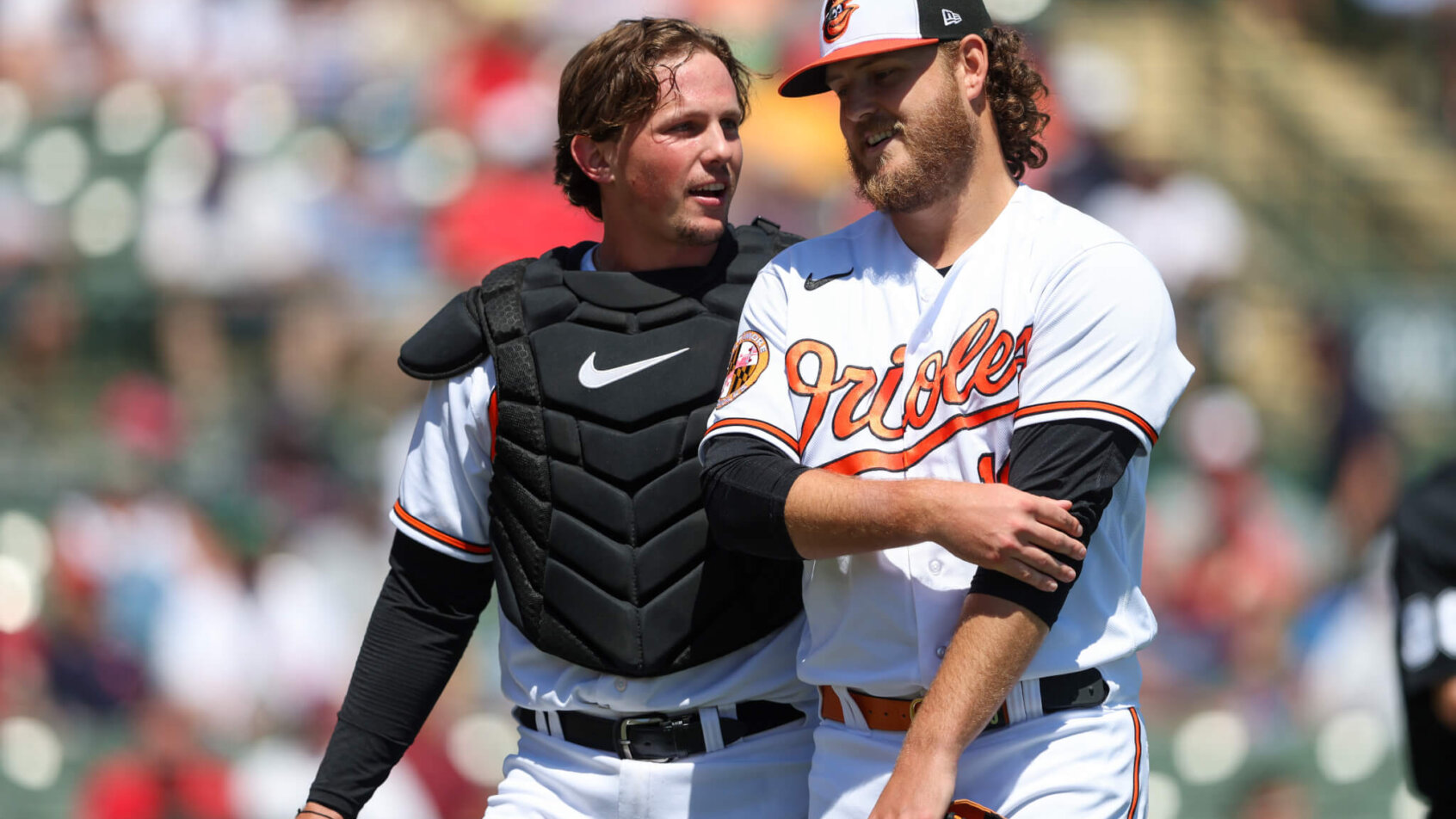 Baltimore Orioles catcher Adley Rutschman talks to starting pitcher Cole Irvin