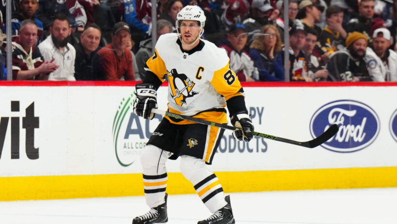 Pittsburgh Penguins center Sidney Crosby watches his empty net puck