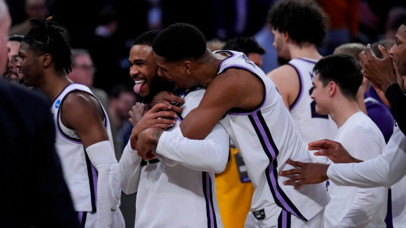 Kansas State players celebrating together