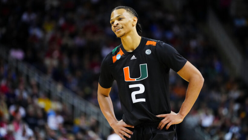 Miami Hurricanes guard Isaiah Wong smiling