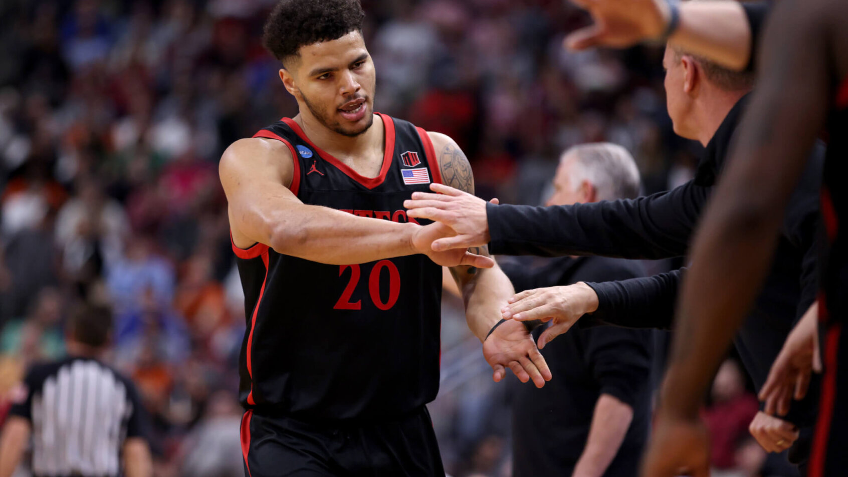 Matt Bradley high fives teammates
