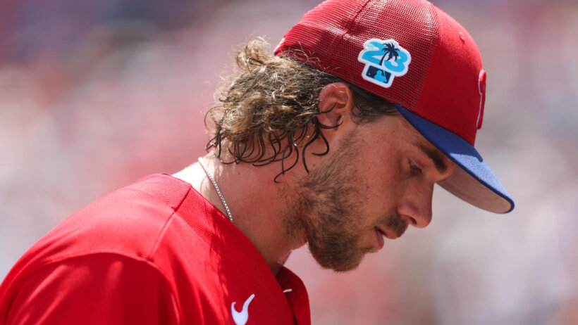 Philadelphia Phillies starting pitcher Aaron Nola looking down