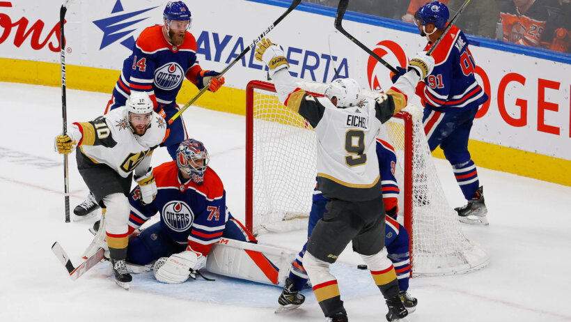The Vegas Golden Knights celebrate a goal by forward Nicolas Roy during overtime against the Edmonton Oilers