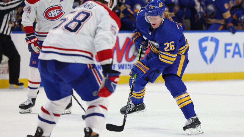 Rasmus Dahlin carries puck up ice