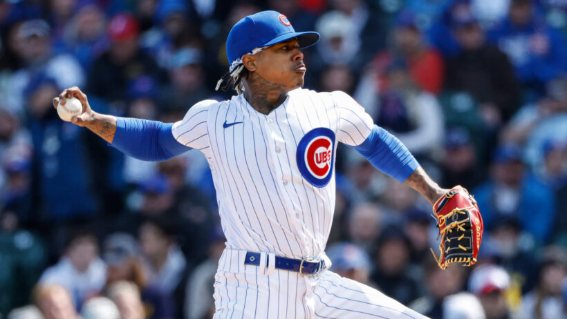 Chicago Cubs starting pitcher Marcus Stroman throwing to home