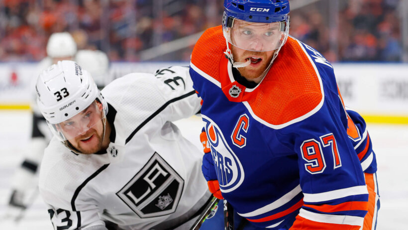 Edmonton Oilers forward Connor McDavid and Los Angeles Kings forward Viktor Arvidsson battle