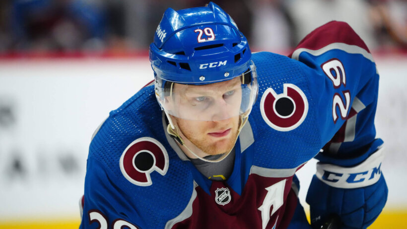Nathan MacKinnon face off