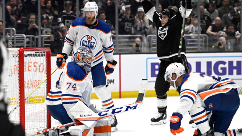 Los Angeles Kings left wing Trevor Moore celebrates after scoring the winning goal as Edmonton Oilers defenseman Mattias Ekholm