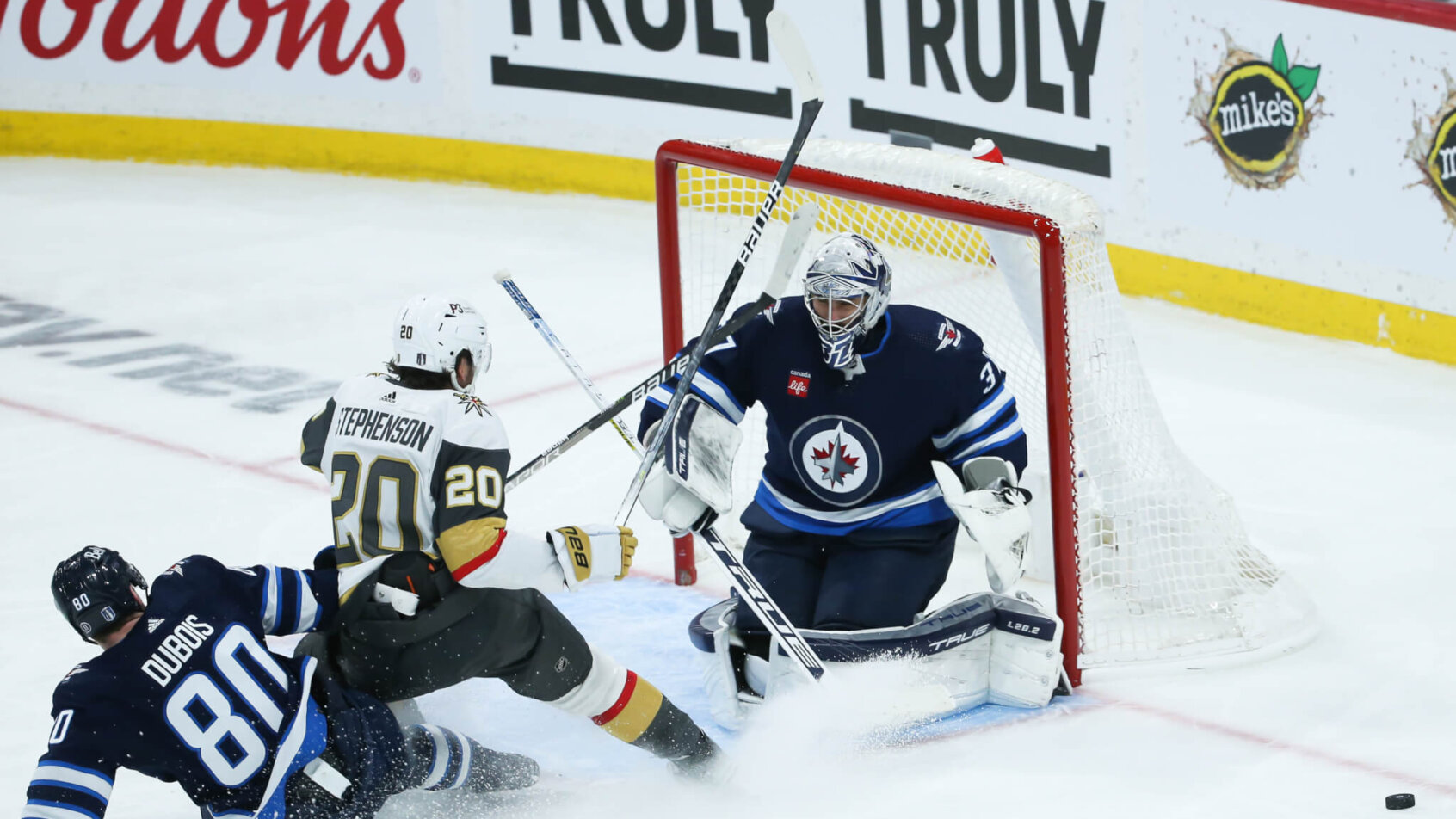 Vegas Golden Knights forward Chandler Stephenson and Winnipeg Jets forward Pierre-Luc Dubois