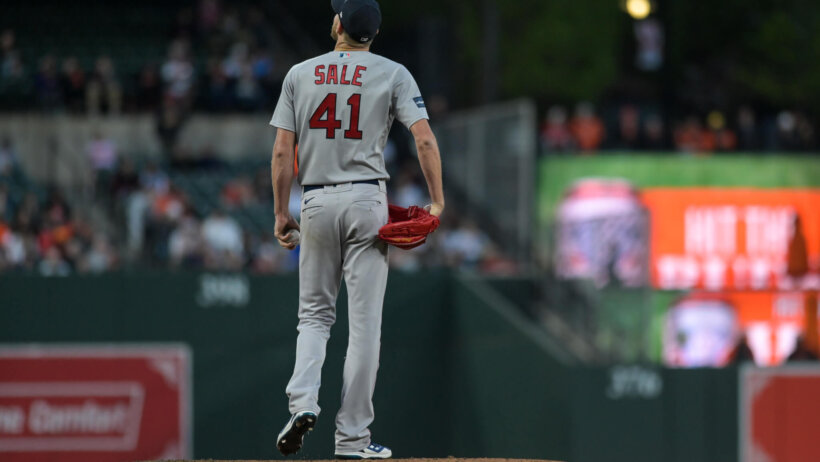 Boston Red Sox starting pitcher Chris Sale looks towards the outfield