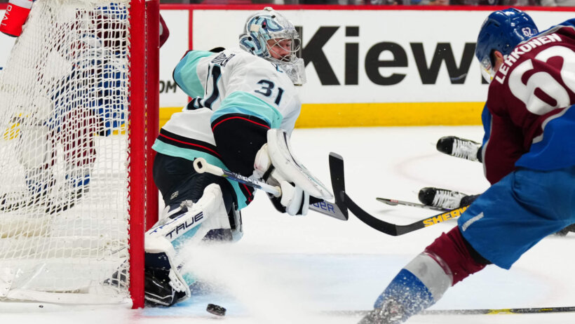 Seattle Kraken goaltender Philipp Grubauer blocks the shot of Colorado Avalanche left wing Artturi Lehkonen