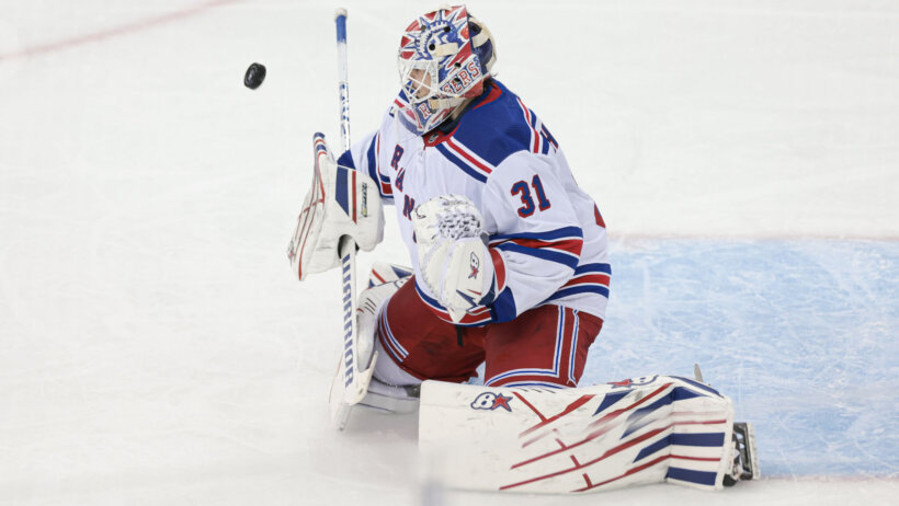 New York Rangers goaltender Igor Shesterkin makes a save against the New Jersey Devils in NHL Playoffs