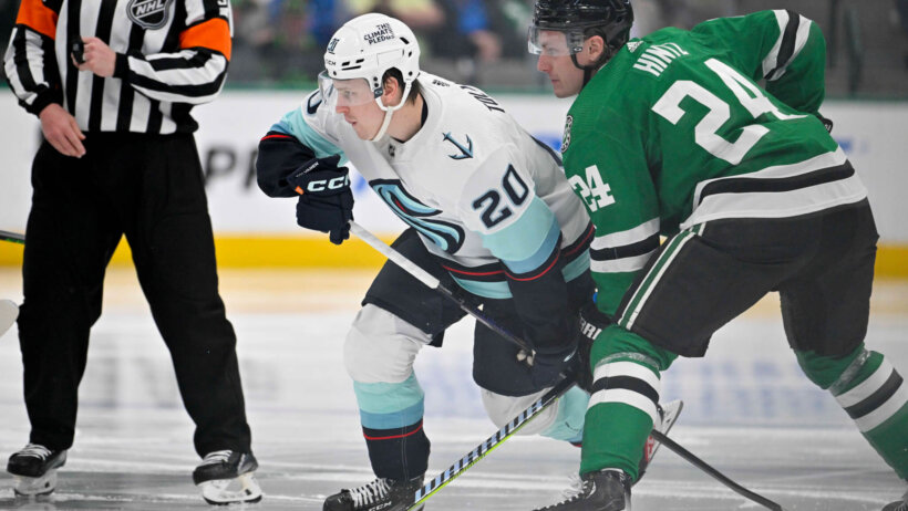 Seattle Kraken right wing Eeli Tolvanen and Dallas Stars center Roope Hintz