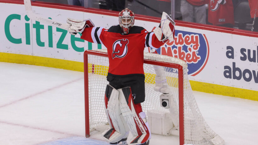 New Jersey Devils goaltender Akira Schmid celebrates the series win