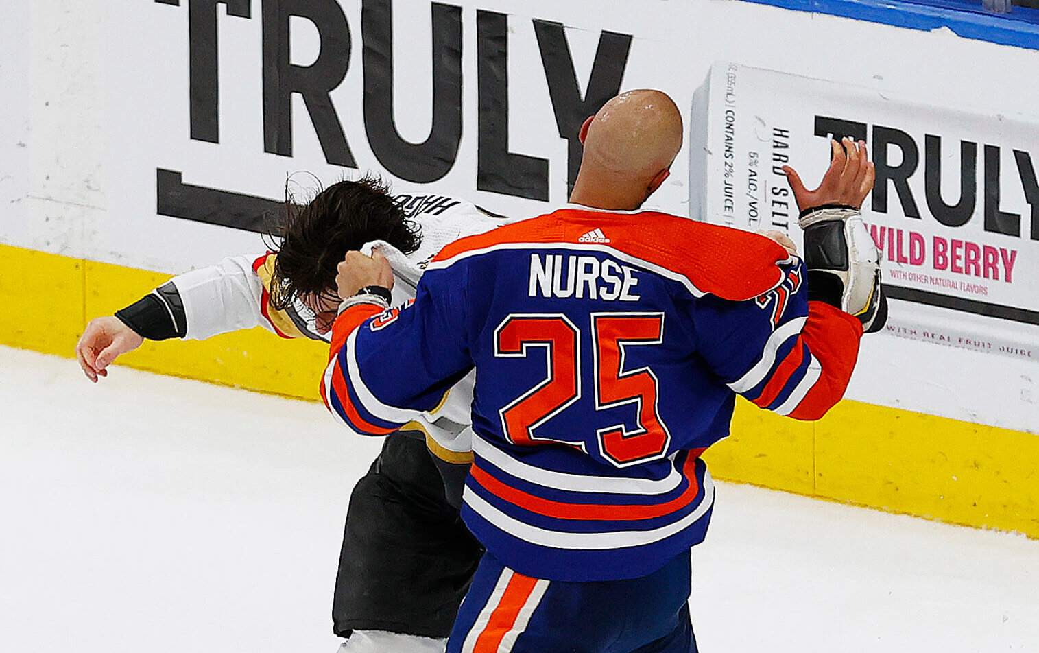 Edmonton Oilers defensemen Darnell Nurse and Vegas Golden Knights defensemen Nicolas Hague fight