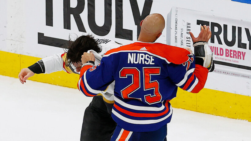 Edmonton Oilers defensemen Darnell Nurse and Vegas Golden Knights defensemen Nicolas Hague fight
