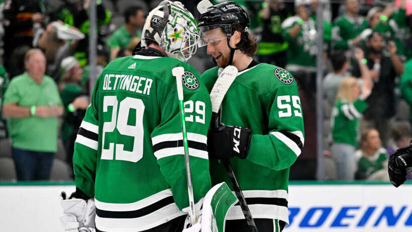 Dallas Stars players celebrating a win against Seattle Kraken
