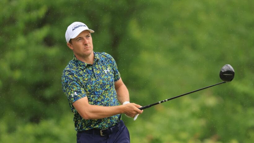 Jordan Spieth watching his tee shot