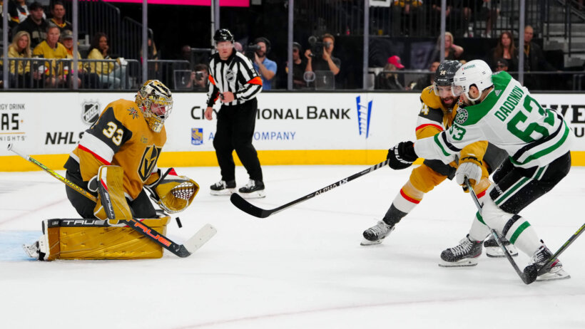 Vegas Golden Knights goaltender Adin Hill stops a shot by Dallas Stars right wing Evgenii Dadonov