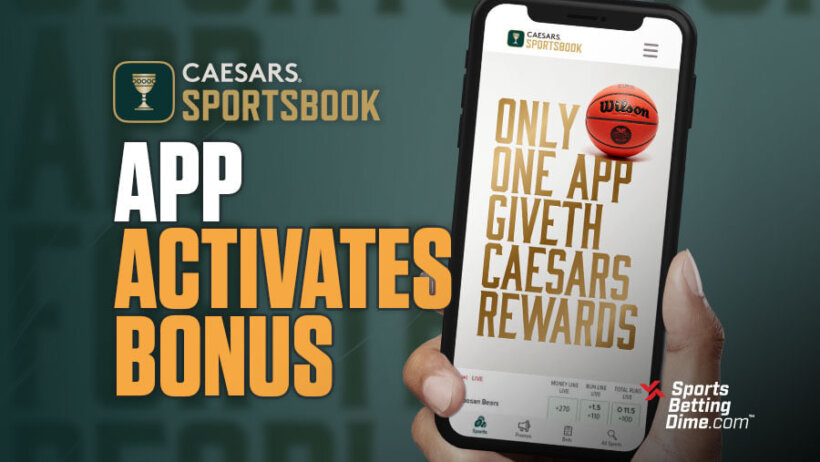 Caesars Sportsbook app hand holding mobile phone