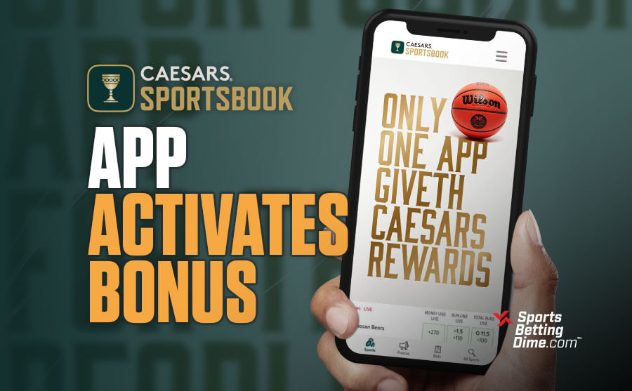 Caesars Sportsbook app hand holding mobile phone